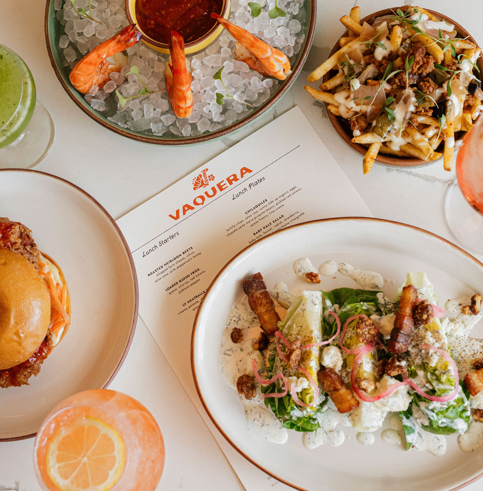 Overhead image of tacos and shrimp cocktail